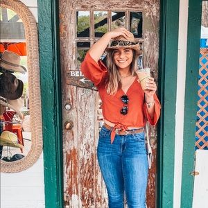 American Eagle polka dot flowy button top